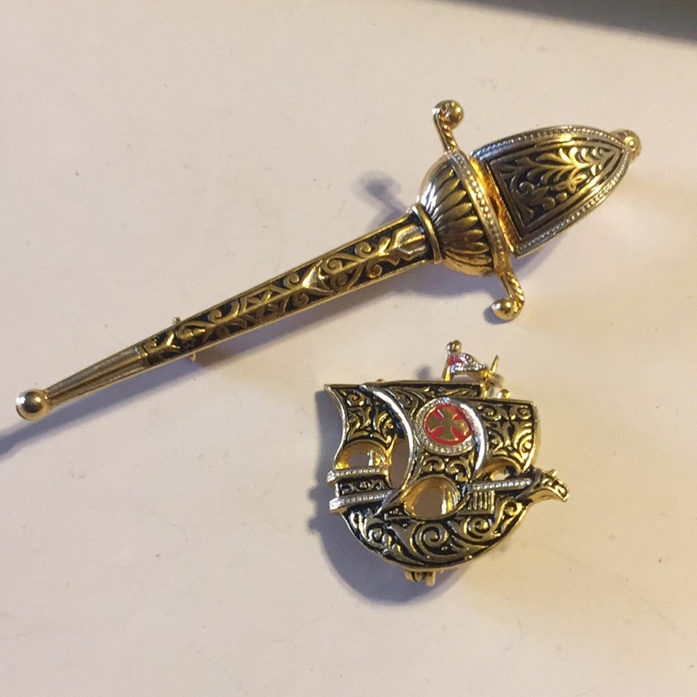Vintage Damascene sword and ship brooches